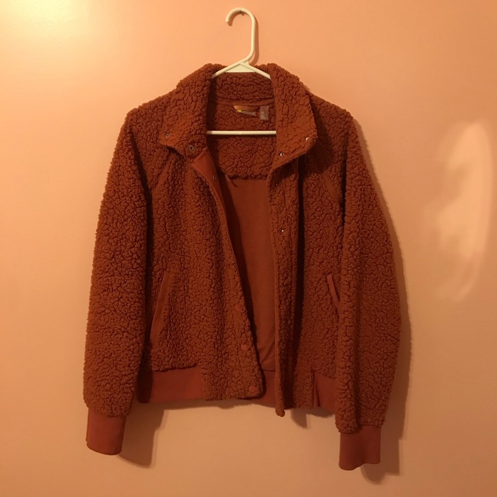 red fuzzy jacket